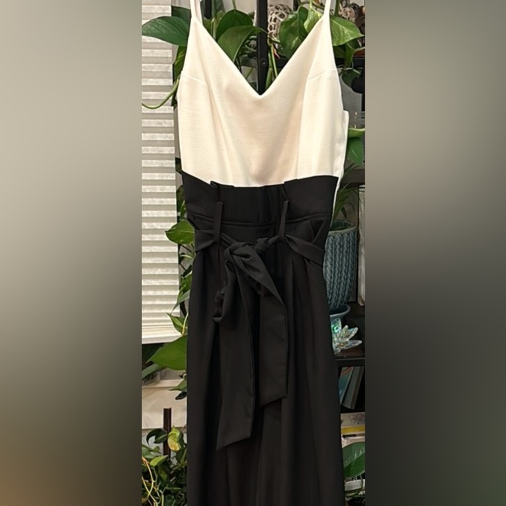 Black and white wide leg pants jumpsuit. Brand new with tags sz small